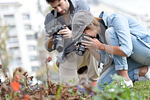 Young photographers making macro photography