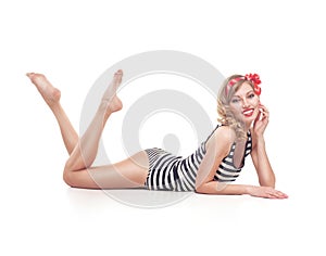 Young pinup woman isolated on white