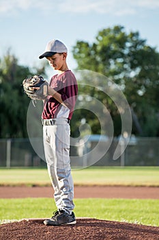 Young Pitcher Concentrating