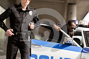 young police officers standing