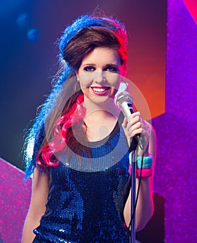 Young pop star performing