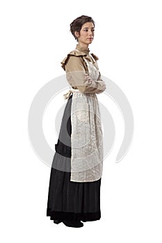 Young prairie woman wearing apron with arms folded isolated on white