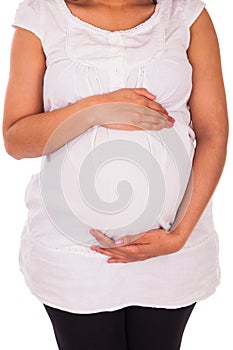 Young pregnant black woman touching her belly