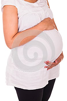 Young pregnant black woman touching her belly