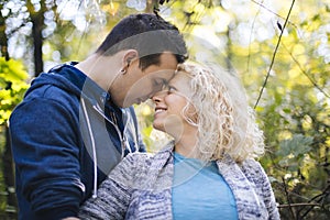 Young pregnant couple in the park