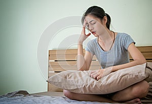 Pregnant woman feeling unwell , suffering from morning sic photo