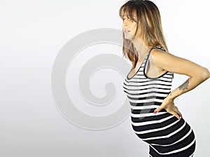 Young pregnant woman having back pain