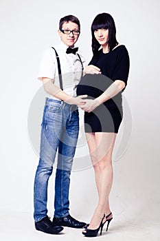 Young pregnant woman with her husband
