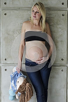 Young pregnant woman with her unborn child
