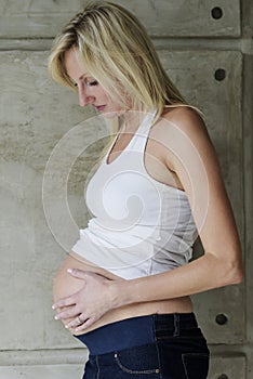 Young pregnant woman with her unborn child