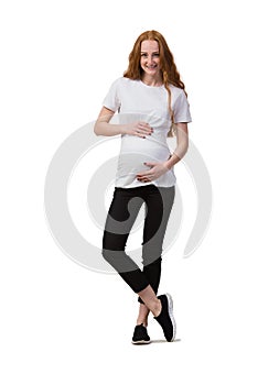 The young pregnant woman isolated on white