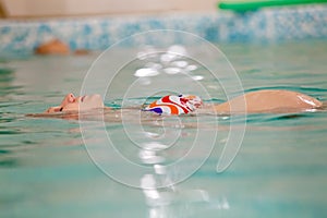 Young pregnant woman in swimming pool