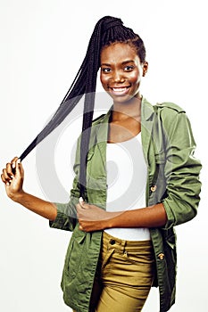 Young pretty african-american girl posing cheerful emotional on white background isolated, lifestyle people concept