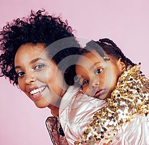 Young pretty african-american mother with little cute daughter h