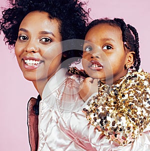 Young pretty african-american mother with little cute daughter h