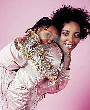 Young pretty african-american mother with little cute daughter h