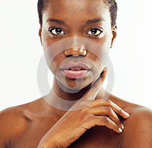 Young pretty african american woman naked taking care of her skin isolated on white background, healthcare people