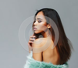 young pretty african-american woman posing in fashion clothers emotional, lifestyle people concept