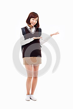 Young pretty Asian student indicate side space photo