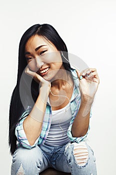 Young pretty asian woman posing cheerful emotional isolated on white background, lifestyle people concept