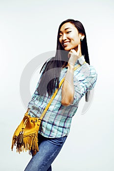 Young pretty asian woman posing cheerful emotional isolated on white background, lifestyle people concept