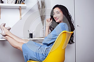 young pretty asian woman smiling in her office, lifestyle people concept