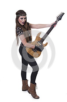 Young pretty blond rocker girl playing electric