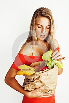 young pretty blond woman at shopping with food in paper bag isol