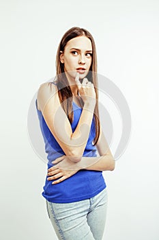 Young pretty brunette woman posing emotional isolated on white background thinking, lifestyle people concept