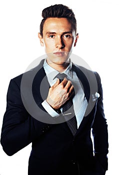 Young pretty business man standing on white background, modern hairstyle, posing emotional, lifestyle people concept