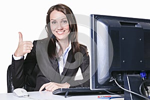 Young pretty business woman with computer in the