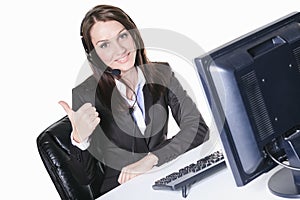 Young pretty business woman with computer in the