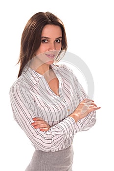 Young pretty businesswoman with arm folded. Full height portrait