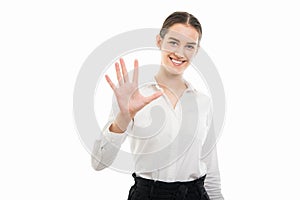 Young pretty bussines woman showing number five with fingers photo