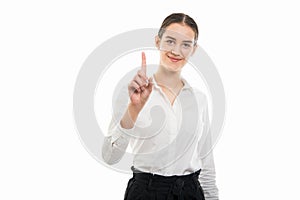 Young pretty bussines woman showing number one with finger