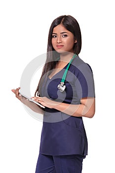 Young pretty doctor with a stethoscope and a medical history in her arms