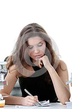 Young and pretty female student with books