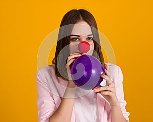 Young pretty girl with balloon, party