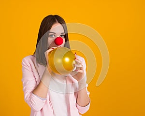 Young pretty girl with balloon, party