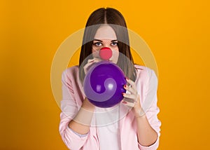 Young pretty girl with balloon, party