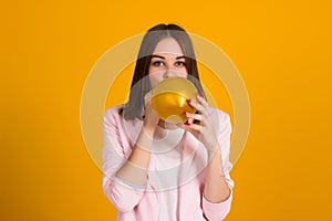 Young pretty girl with balloon, party