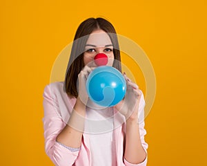 Young pretty girl with balloon, party