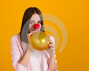 Young pretty girl with balloon, party