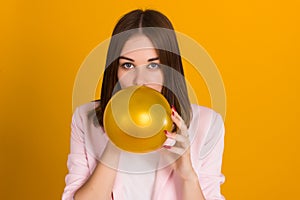 Young pretty girl with balloon, party