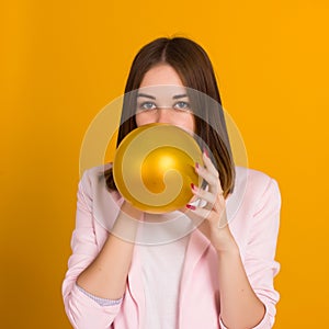 Young pretty girl with balloon, party