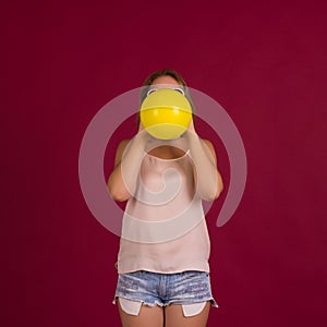 Young pretty girl with balloon, party