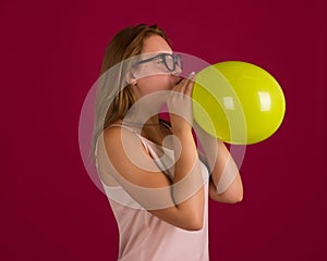 Young pretty girl with balloon, party