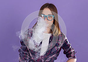 Young pretty girl with electronic cigarette