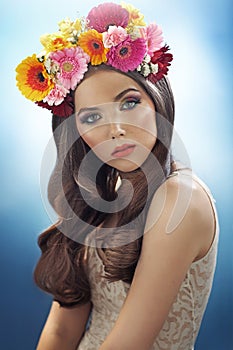 Young pretty girl with the flower hat