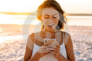 Young pretty girl using mobile phone